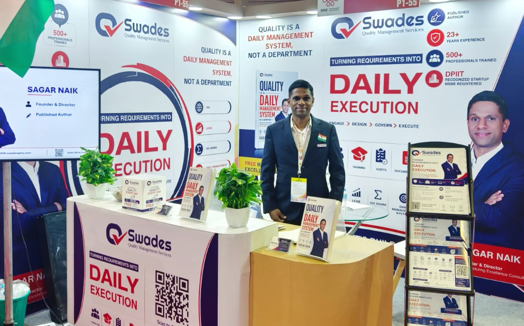 The Swades Quality Management Services stall at Bharatiya Vyapar Mahotsav 2026 with Sagar Naik’s book on display