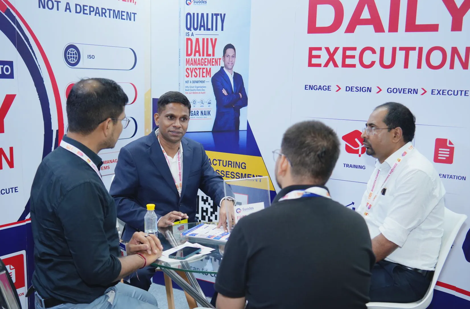 Sagar Naik with his book at the Swades stall during the exhibition